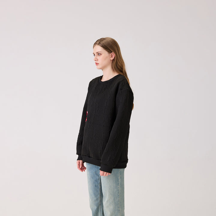 The Peekaboo Chic Iconic Sweater
