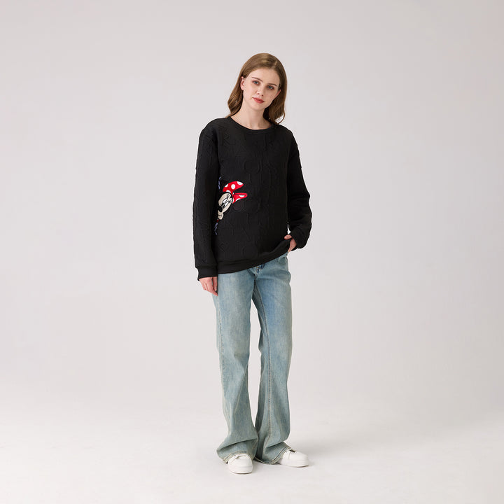 The Peekaboo Chic Iconic Sweater