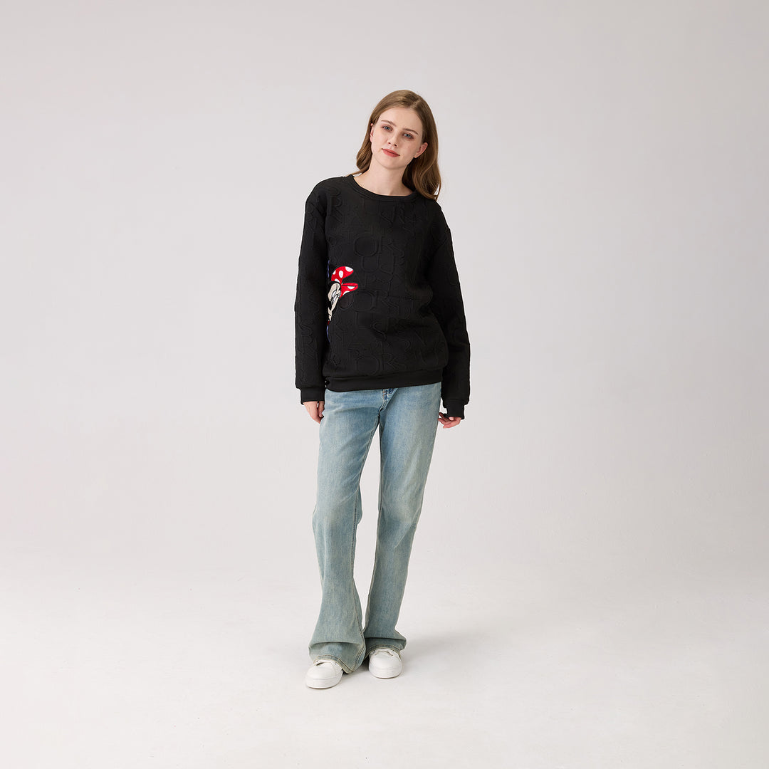 The Peekaboo Chic Iconic Sweater