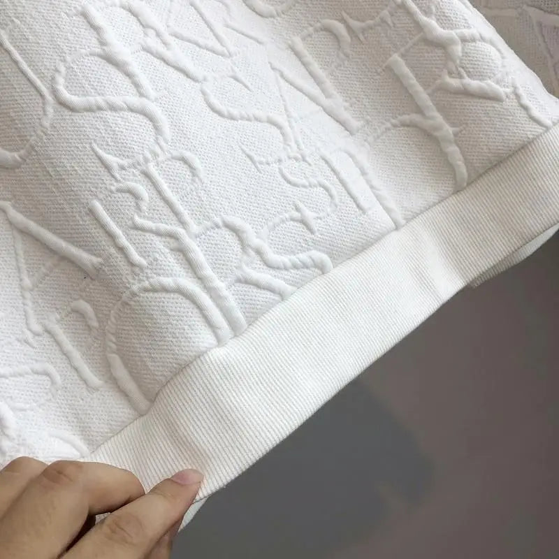 The Peekaboo Chic Iconic Sweater