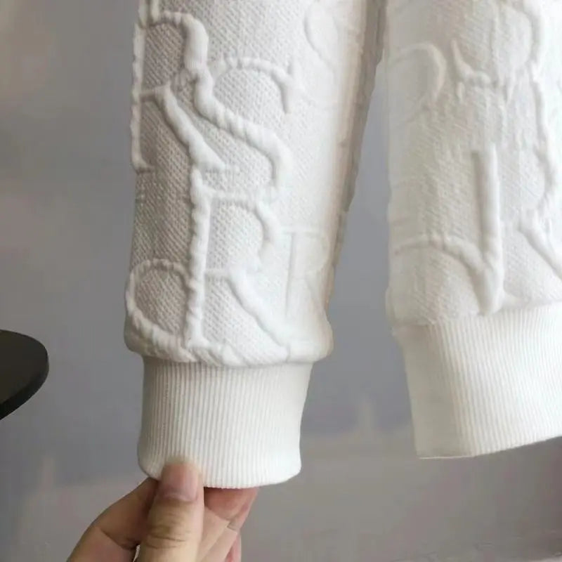 The Peekaboo Crew Iconic Sweater